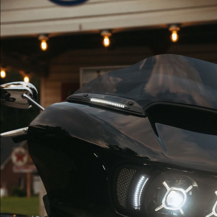 LED Windshield Trim with Auxiliary Turn Signals for Rushmore Road Glide